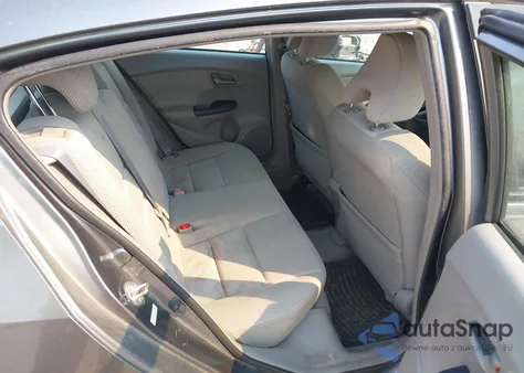 2010 Hond Insight z USA, uszkodzony, nr VIN JHMZE2H75AS027964